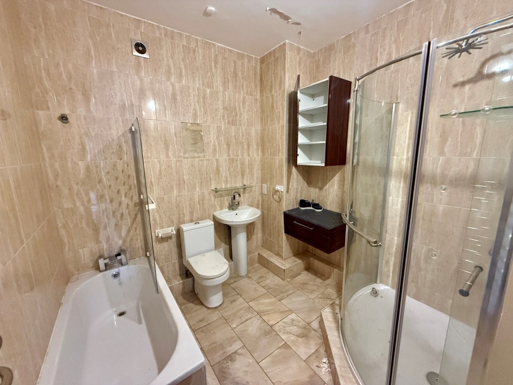 Lot: 45 - COMMERCIAL INVESTMENT WITH PLANNING FOR CONVERSION OF UPPER PARTS - First Floor - Bathroom and shower room one